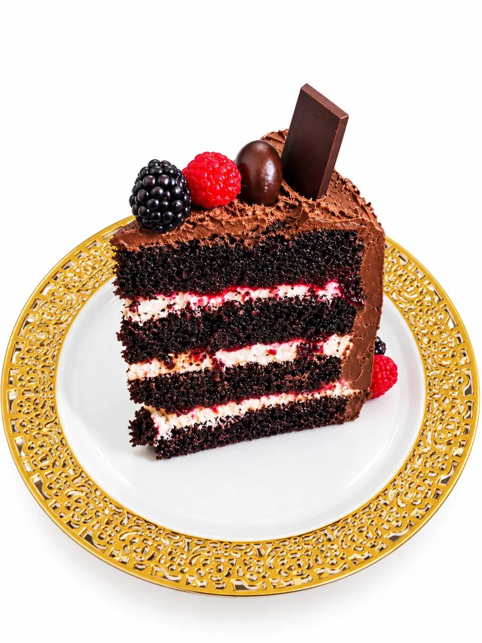 Slice of chocolate berry cake with raspberries and blackberries